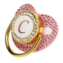 Succhietto per bebé con strass dorato e design ergonomico curvato in silicone