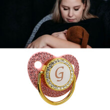 Paci d'oro unico per bambini con decorazione in strass e design ergonomico curvato