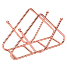 Koperen servettenhouder voor op tafel, gemaakt van zwaar staaldraad met een roestbestendige, stevige voet. Elegant en modern design, geschikt voor