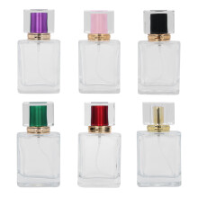 Frasco de perfume de vidro com spray de névoa fina, reutilizável, com design elegante, seguro e durável, ideal para viagens e uso diário.