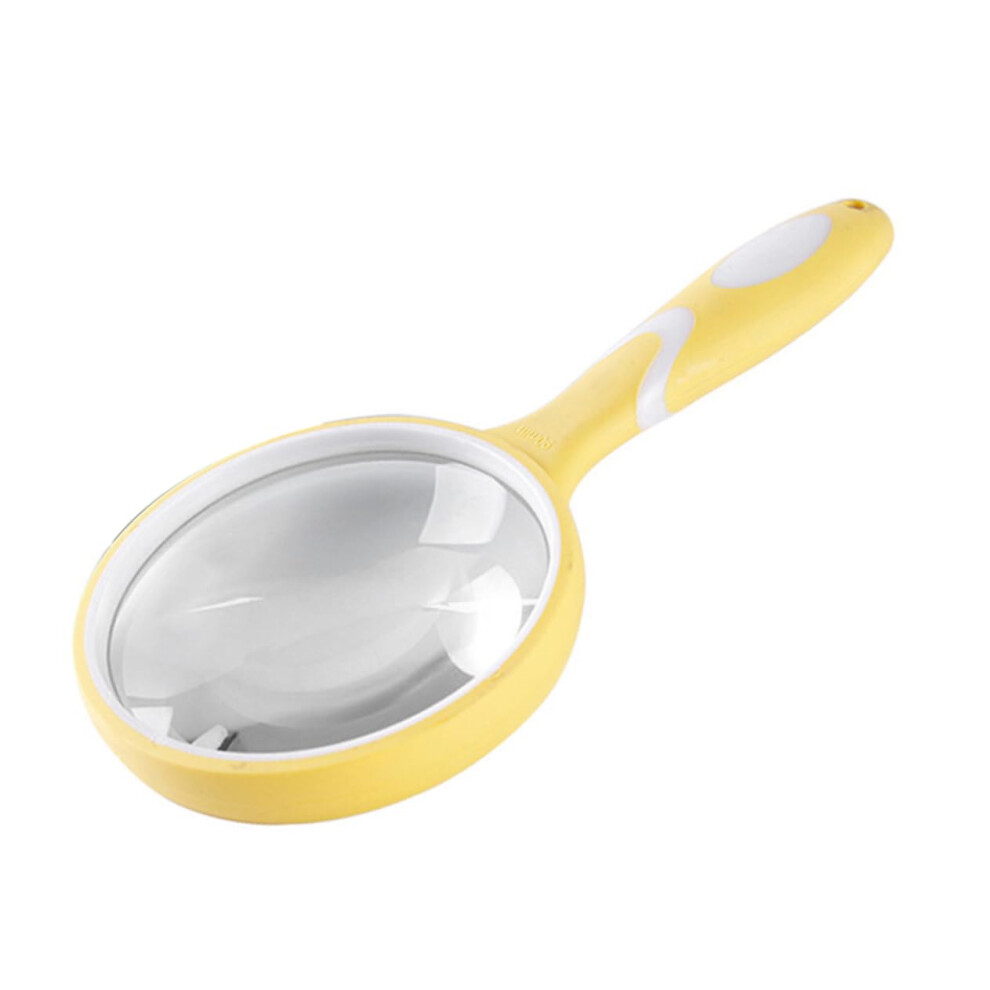 Handheld magnifying glass with rubber grip for seniors to read books and explore nature.