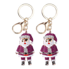 Feestelijke sleutelhanger met kerstmanhanger van strasssteentjes, gemaakt van zinklegering. Ideaal cadeau voor de kerstdagen. Schattige sleutelhanger.