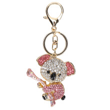 Sleutelhanger met pluizig bolletje en verguld koala-hangertje. Leuke koala-sleutelhanger voor meisjes en vrouwen, gemaakt van duurzaam metaal met een