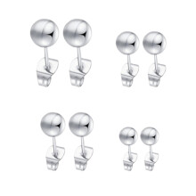 Pendientes minimalistas de acero inoxidable, pulidos, de color, sin níquel ni plomo, ligeros y con un diseño único. Incluyen un embalaje de regalo
