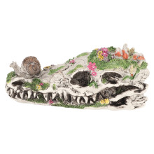Caracol de resina sobre estatua de calavera, calavera de dinosaurio decorativa, calavera de dinosaurio creativa, decoración de jardín finamente