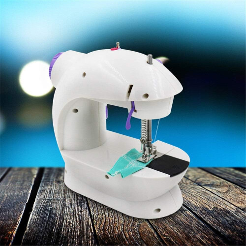 Mini Electric Sewing Machine with Light, Compact Size, Easy Operation for Beginners, Purple 21x19x9cm 1