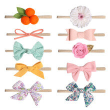 Delicato fiocco a fiorellino morbido ed elastico per la tua principessa, design e colori eleganti, fasce per capelli per neonati in nylon