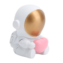 Astronautenbeeldje met ruimtethema voor slaapkamerdecoratie, handgeschilderd beeldje van een astronaut zittend op een raket, miniatuursculptuur van