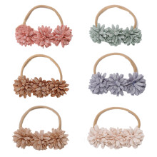Elegantes Haarband mit Blumen für Neugeborene und Kleinkinder, bezaubernde künstliche Gänseblümchen auf weichem, dehnbarem Haarband,