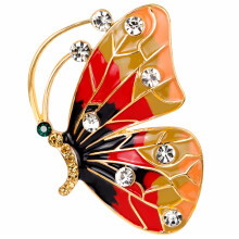Stilvolle Schmetterlingsbrosche mit glänzenden Akzenten aus Metalllegierung und Kristallen. Elegantes Design, exquisite Details, vielseitig