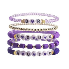 Conjunto de 5 pulseiras de miçangas, design artesanal em mistura de polímeros com cordão elástico ajustável e miçangas roxas, ideal para