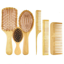 Ontwart gemakkelijk klitten met deze bamboeborstelset en bevordert een gezonde haargroei voor alle haartypes.