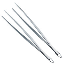 Robuster Edelstahl-Lebensmittelgreifer mit benutzerfreundlichem Design und präzise gezahnten Spitzen für den vielseitigen Einsatz in Küchen,