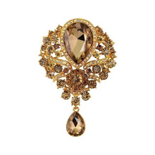 Spilla da donna di lusso con ciondolo a goccia e strass, ideale per matrimoni e cocktail.