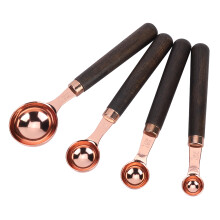 Set di 4 misurini Heaveant in acciaio inossidabile color oro rosa con manico in legno, ideali per la cottura al forno.