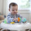 Ingenuity Ingenuity Smooth Strides Activity Walker - Chambray - Developmental Walker - 3 Position heightbar - Toys Included - 6M-12M 2