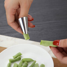Éplucheur à noix et fruits Xeyise en acier inoxydable, outil de cuisine avec protection pour les doigts