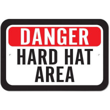 Segnale di pericolo per l'area con casco di sicurezza.