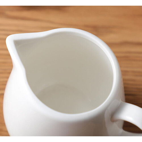 Mini Ceramic Milk Jug with Handle Bone China Small Coffee Pitcher Compact Elegant Design 1