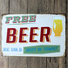 Witte retro design metalen blikken bord met de tekst "IJskoud gratis bier", wanddecoratie met print op de achterkant van een blikken bord, geschikt