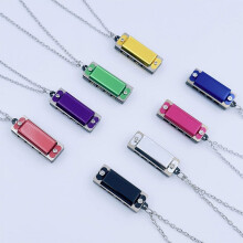 8 stuks mini-harmonica ketting, schattige mini-harmonica met 4 gaatjes en 8 tonen, perfect als muziekfeestcadeautje.