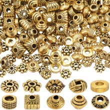 1 Schachtel, 250 Stück, 10 verschiedene Formen von tibetischen Legierungs-Abstandsperlen, gemischte Formen, Antikgold, 5–7 x 2–6,5 mm,