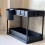 Sliding double-layer storage drawer rack for with hooks under the sink for kitchen storage. 3