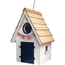 Hut aan de kade, wit vogelhuisje