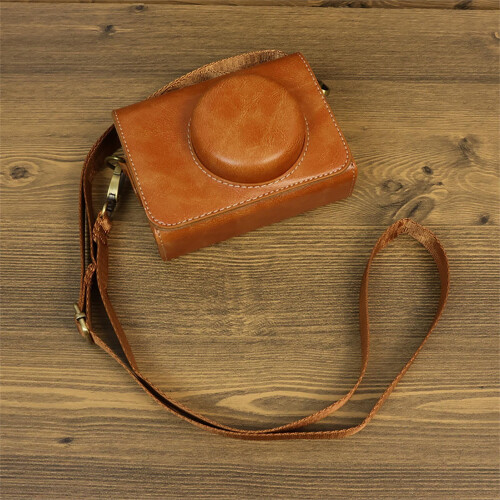 Capa protetora elegante e portátil para câmera digital, ideal para viagens.