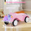 Auto per bambini con clacson, luci a LED, contenitore, rosa 4