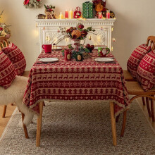 Nappe rouge imprimée Noël, motif sapin de Noël, cloches et cerfs, bordure dorée, pour table basse.