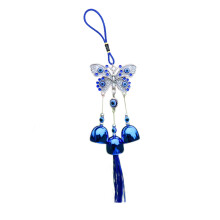 Carillon à vent en métal avec yeux bleus et pompon décoratif pour sapin de Noël