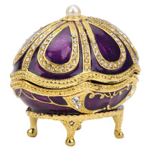 Geëmailleerde sieradendoos met Fabergé-ei-design en strass-steentjes. Decoratieve sieradenopbergdoos van hoogwaardige zinklegering, symbool van