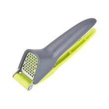Stainless Steel Garlic Press and Mincer with Ergonomic Comfort Grip for Easy Kitchen Use Green