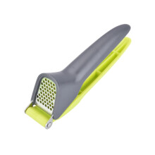 Garlic Press and Mincer with Large Capacity Chamber Non Slip Comfortable Grip for Kitchen Ginger Nuts