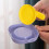 Garlic Press and Grinder with BuiltIn Container, Multipurpose Manual Vegetable Crusher Yellow 2