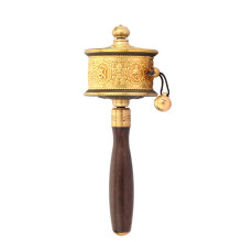Tibetan Prayer Wheel Brass Handheld Design with Smooth Silent Rotation and Detailed Ethnic Engraving for Meditation Gift Home Decor