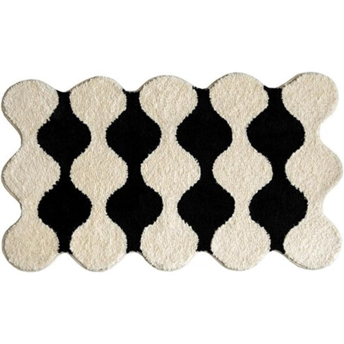 Modern zwart-wit vloerkleed in Y2K-stijl.