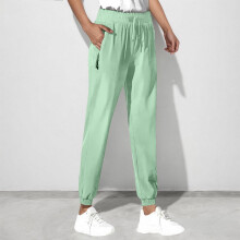 Pantaloni da jogging da donna a tinta unita con coulisse e tasche con cerniera, in poliestere, vestibilità ampia, ideali per allenamento e corsa.
