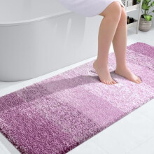 Tappeto da bagno 59x24, in morbida microfibra assorbente, con retro in gomma, ad asciugatura rapida e lavabile, colore rosa-violaceo.