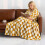 Yellow checkered flannel blanket with black and white 4