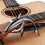 Gitarrcapo i zinklegering svart med plektrum 6