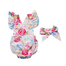 Babyrompertje/kleding set voor peuters: mouwloze romper met bloemenprint en hoofdband, tweedelig kinderkledingstuk in blauw.