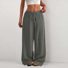 Calça feminina esportiva casual de cor sólida com cintura elástica e bolsos laterais.