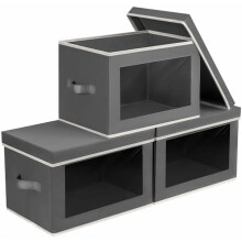 Contenitore in tessuto con finestra trasparente, coperchio e maniglie.