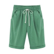 Naisten shortsit taskuilla, vihreät jerseyshortsit, L-koko