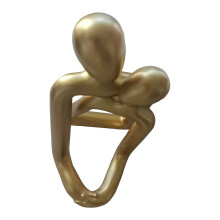 Support de téléphone en résine représentant un couple enlacé