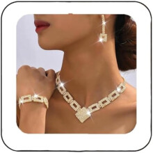Conjunto de joias de noiva com cristais, colar, brincos e pulseira cravejados de strass prateados. Bijuterias formais para mulheres e noivas.