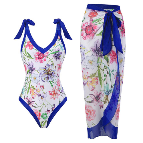 Maiô feminino de uma peça com alça única e saia longa estampada.