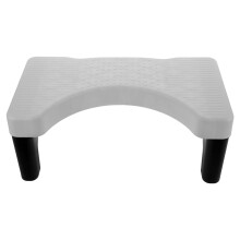 Tabouret de toilette en plastique gris, idéal pour s'accroupir. Surface résistante et facile à nettoyer.